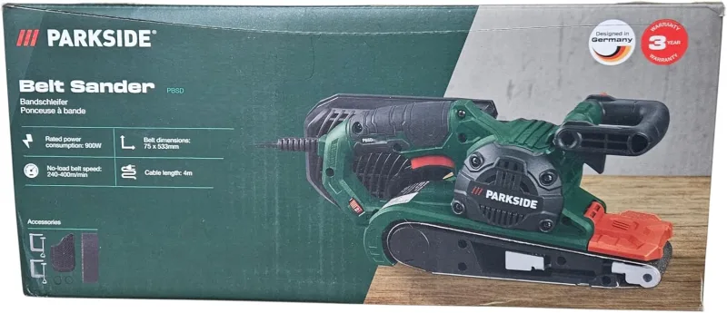 Parkside Lijadora de banda PBSD 600 A1, 600W, 170-250 m/min, 75 x 457 mm, Incluye caja de polvo, adaptador, 2 terminales y cinta abrasiva (grano 80), Conector para extracción de polvo externa