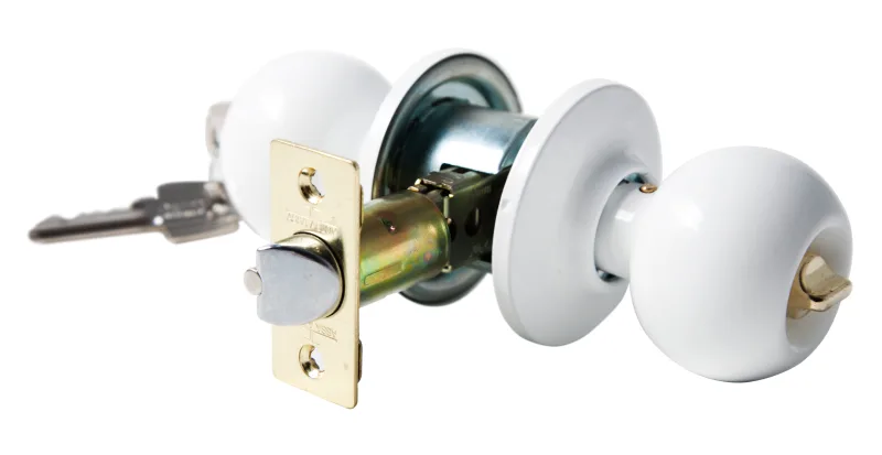 Pomo de puerta con mecanismo para puerta de entrada en latón