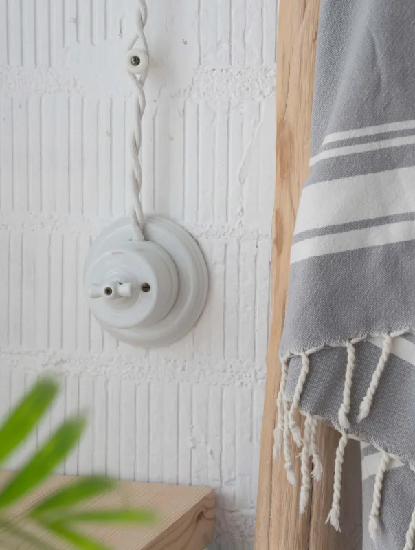 Pulsador de botón fontini garby de porcelana blanco de 10a 250v