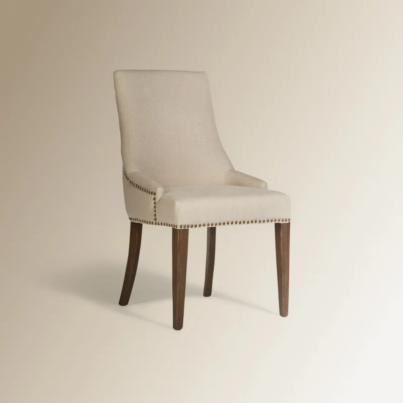 El Corte Inglés - Sillón tapizada en lino Olivia.