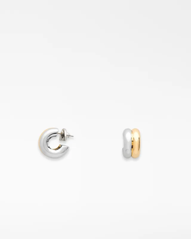 Adolfo Dominguez - Aros metálicos bicolor.