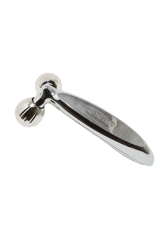 Rodillo masajeador facial Shiseido / Diseño ergonómico y suave, estimula la circulación, mejora la firmeza y luminosidad de la piel, ideal para rutina diaria