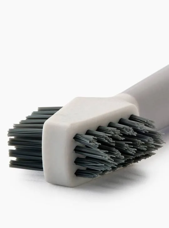 Cepillo limpieza 3 en 1 Joseph Joseph CleanTech™, limpieza detallada, para juntas y esquinas, cerdas planas y en V, raspador integrado, diseño compacto y ergonómico - piedra
